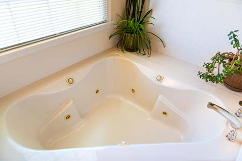 New bathtub installation by Super Service Plumbing in a residential home.