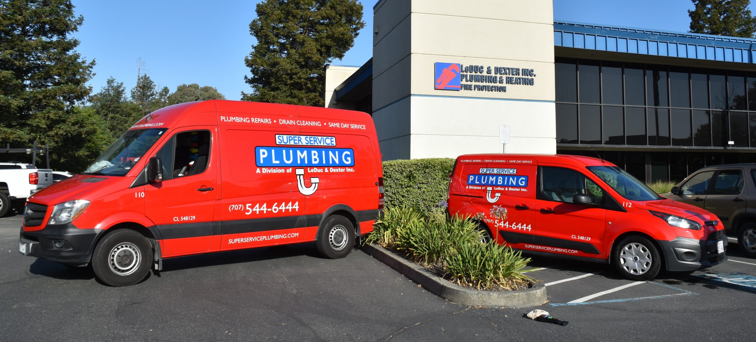 Plumber in Santa Rosa repairing a water heater in a residential home.